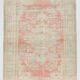 Tapis vintage rouge pâle et beige