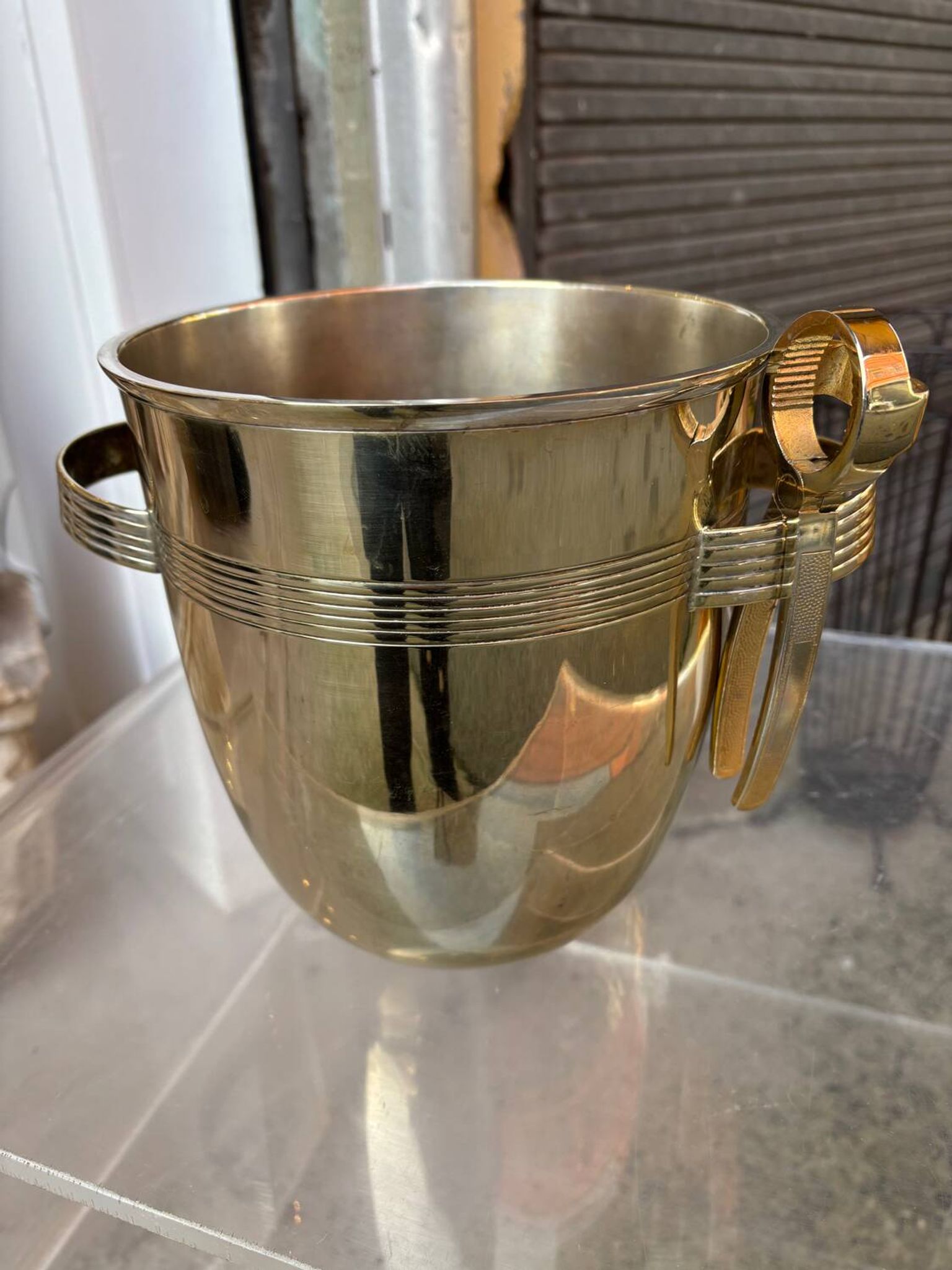 Alpaca champagne bucket from the 1920s with its monopole tongs.