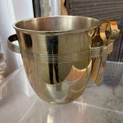 Alpaca champagne bucket from the 1920s with its monopole tongs.
