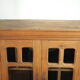 Antique walnut display cabinet from the 20th century.