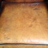 Sheepskin leather chair with a beautiful patina