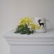 Fawn pitcher and rabbit
