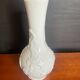 A pair of vintage vases in glazed porcelain.
