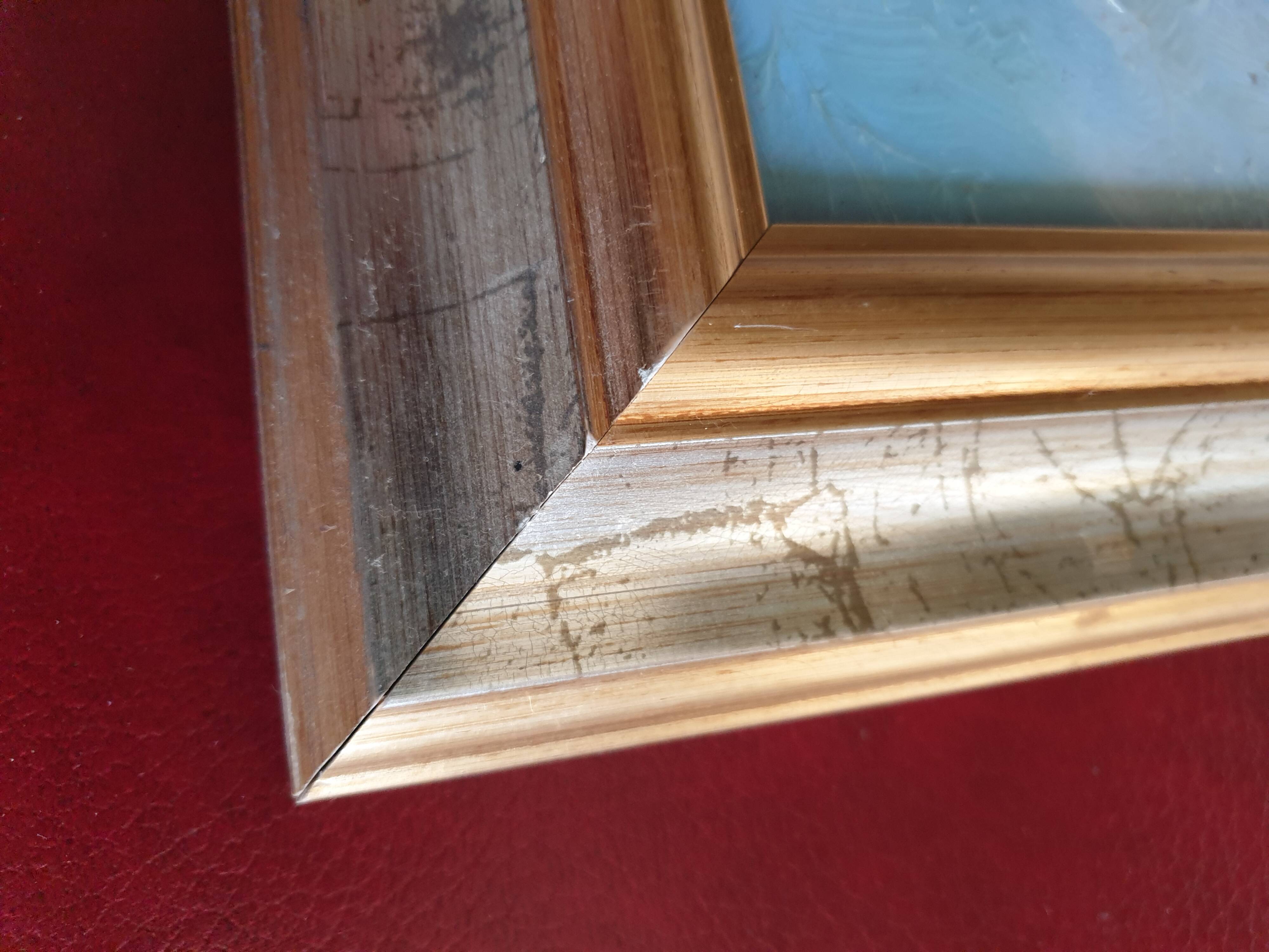 Set of two paintings with identical gold and silver frames