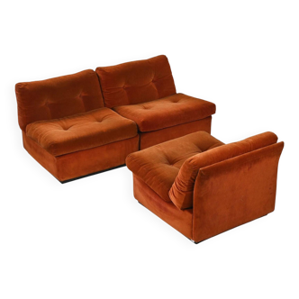 Set of three vintage armchairs. 1970s. Orange corduroy.