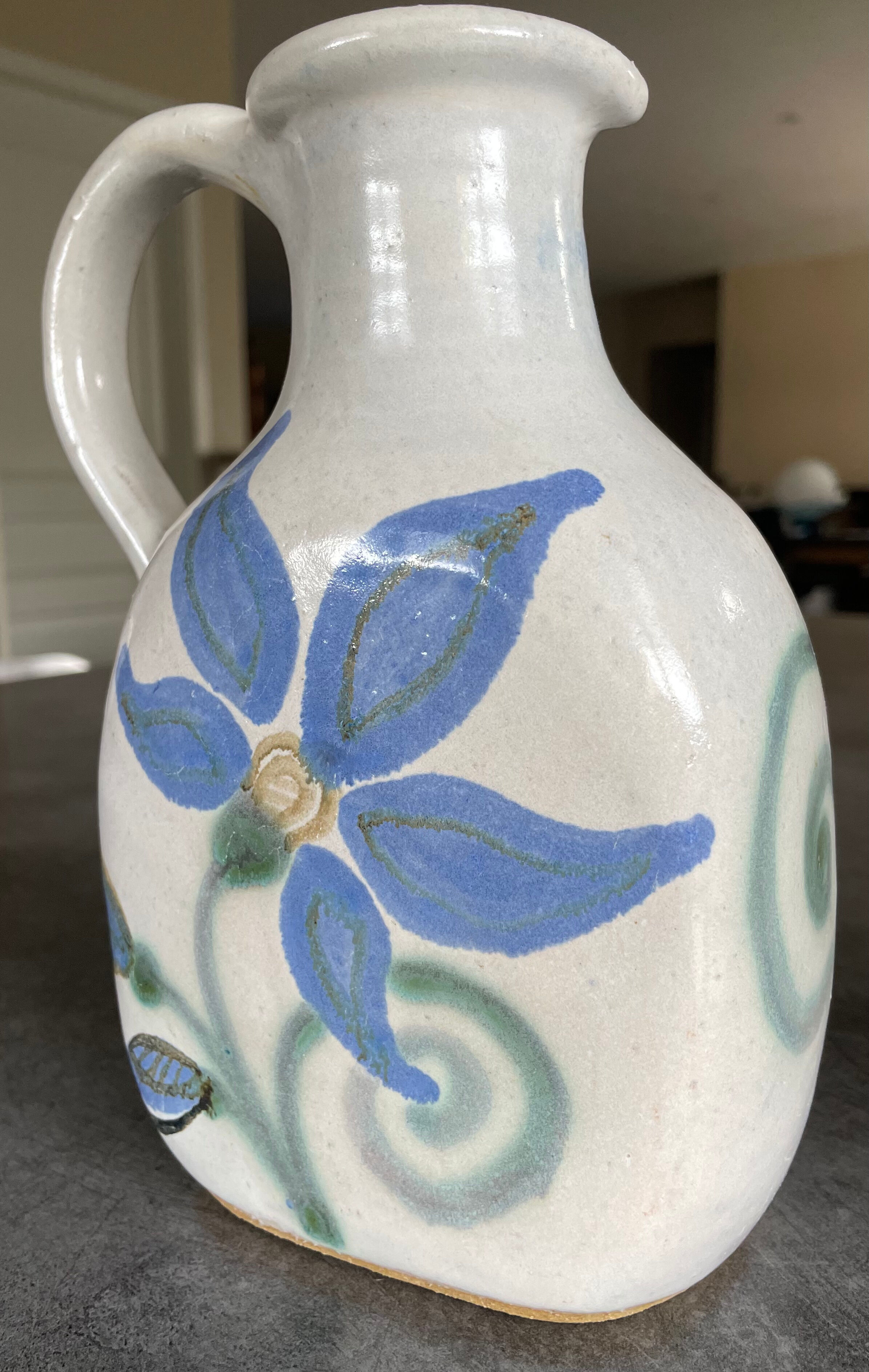 Vintage signed stoneware pitcher jug with floral painting decoration