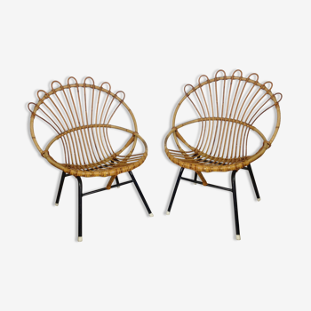 Pair of armchairs in rattan with black metal base