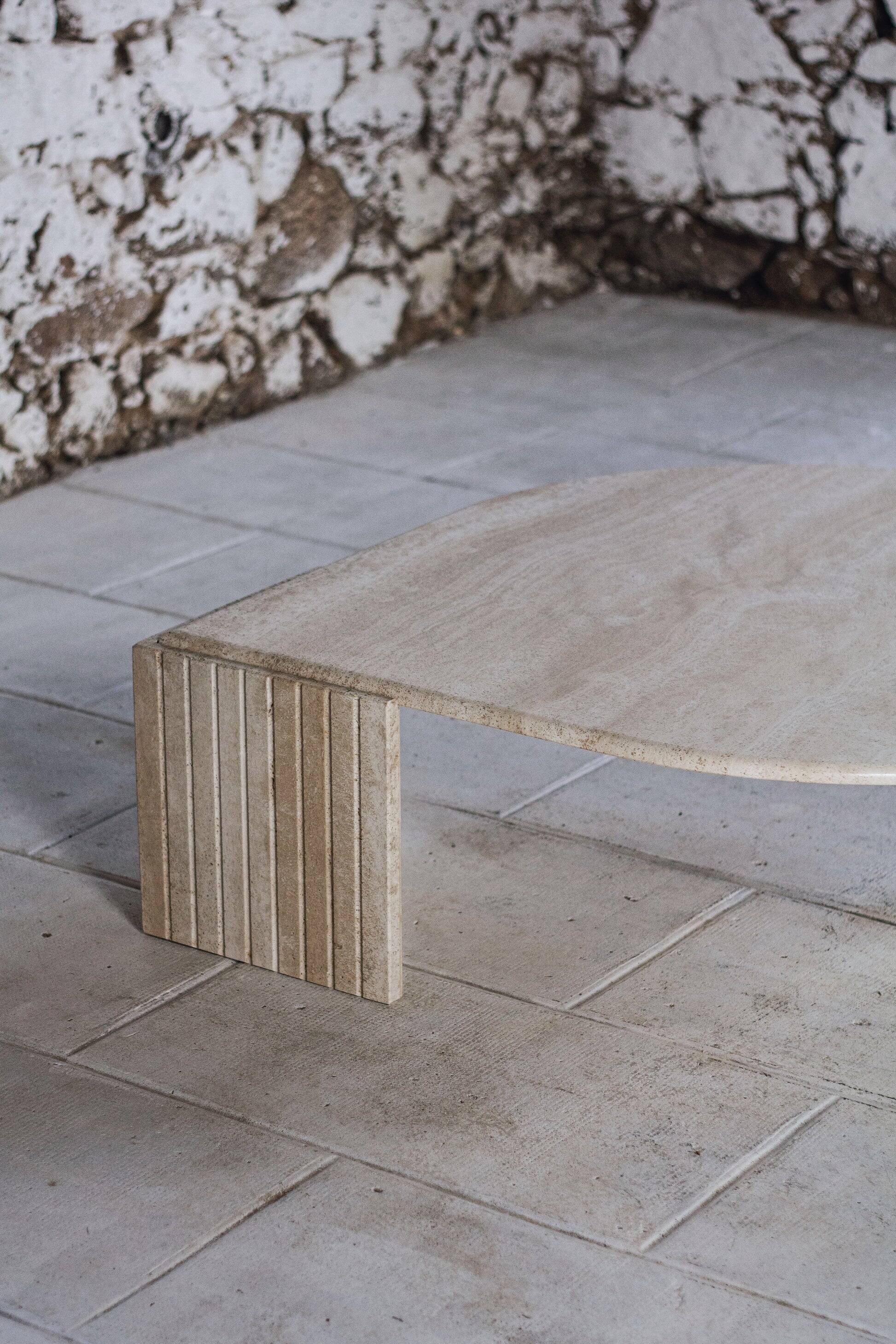 Travertine coffee table "Eye" or "drop" by Roche Bobois, 1980