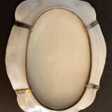 Old dish mounted in ceramic, scallop