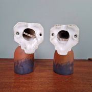 Pair of Art Deco wall sconces in multicoloured porcelain and frosted glass.
