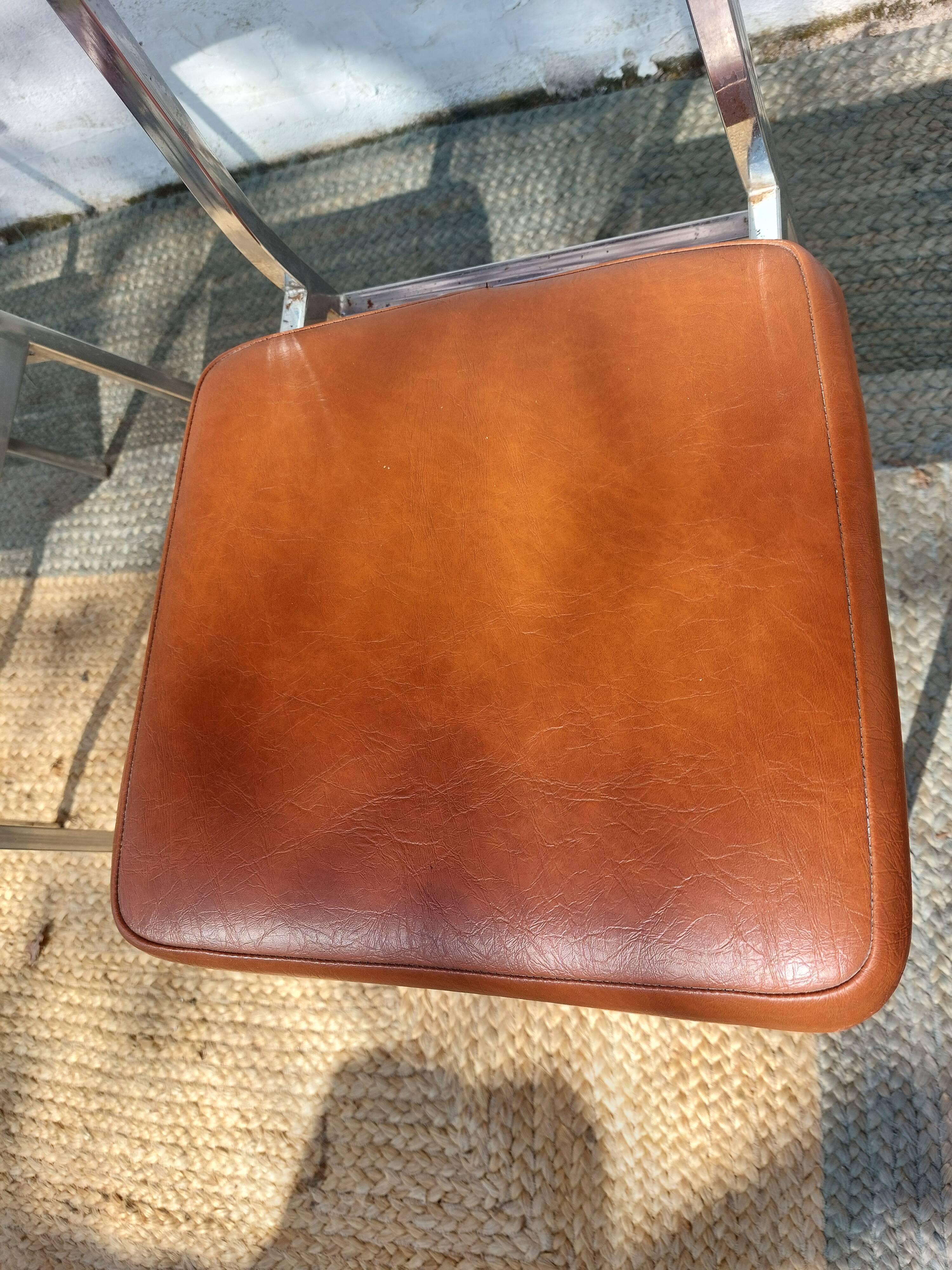 3 stainless steel tube chairs and faux leather, vintage