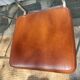 3 chaises vintage en inox et simili-cuir marron