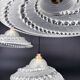 Set of 3 moulded glass pendant lights with cabochons, Art Deco style Ezan.