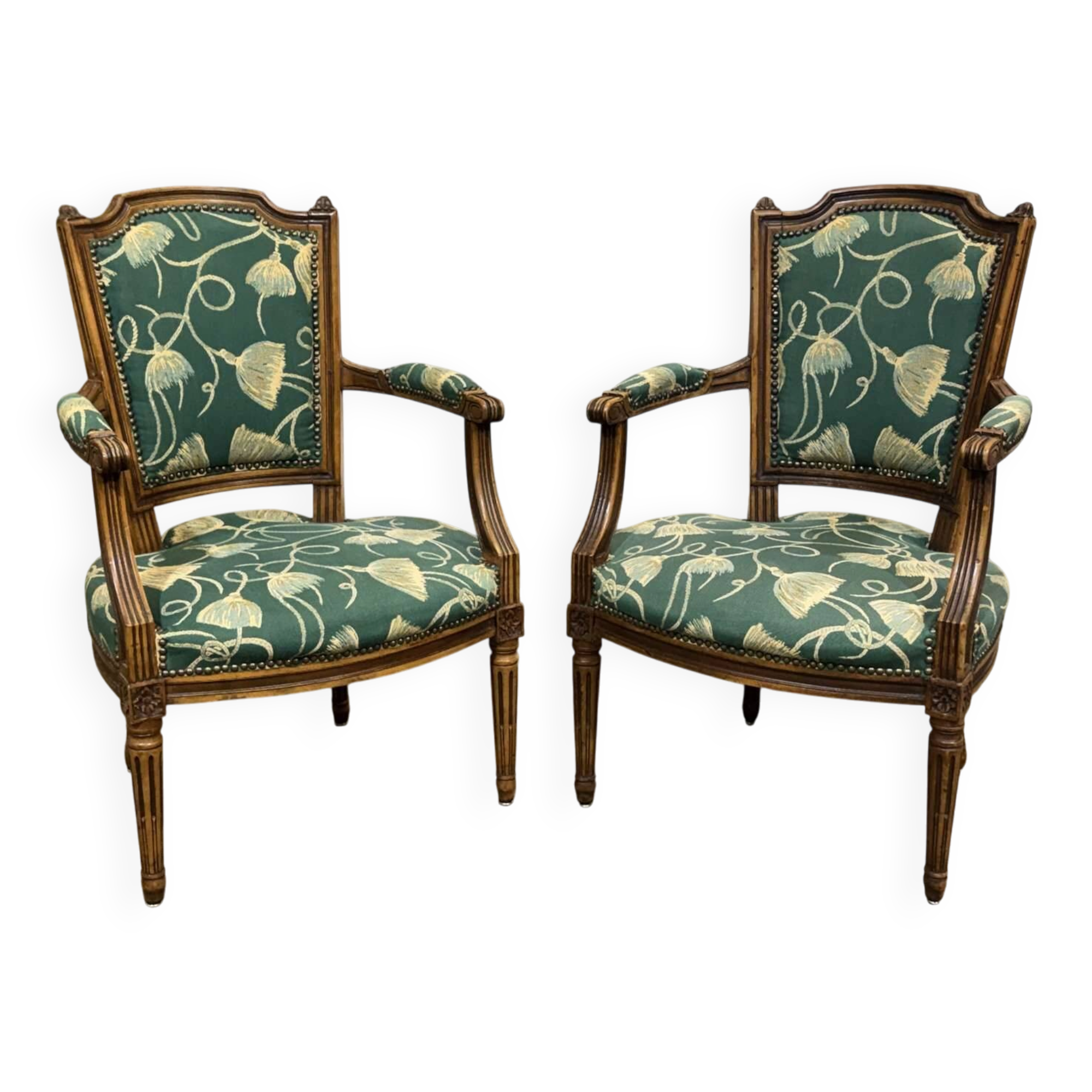Pair of Louis XVI style armchairs in beech from the 19th century.
