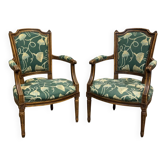 Pair of Louis XVI style armchairs in beech from the 19th century.