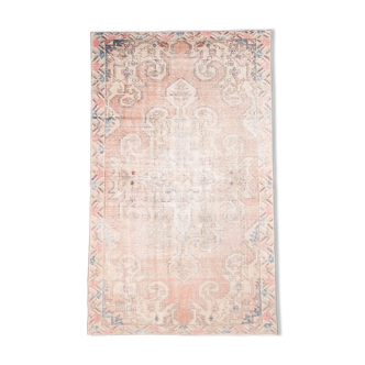 Tapis en laine orange pastel doux