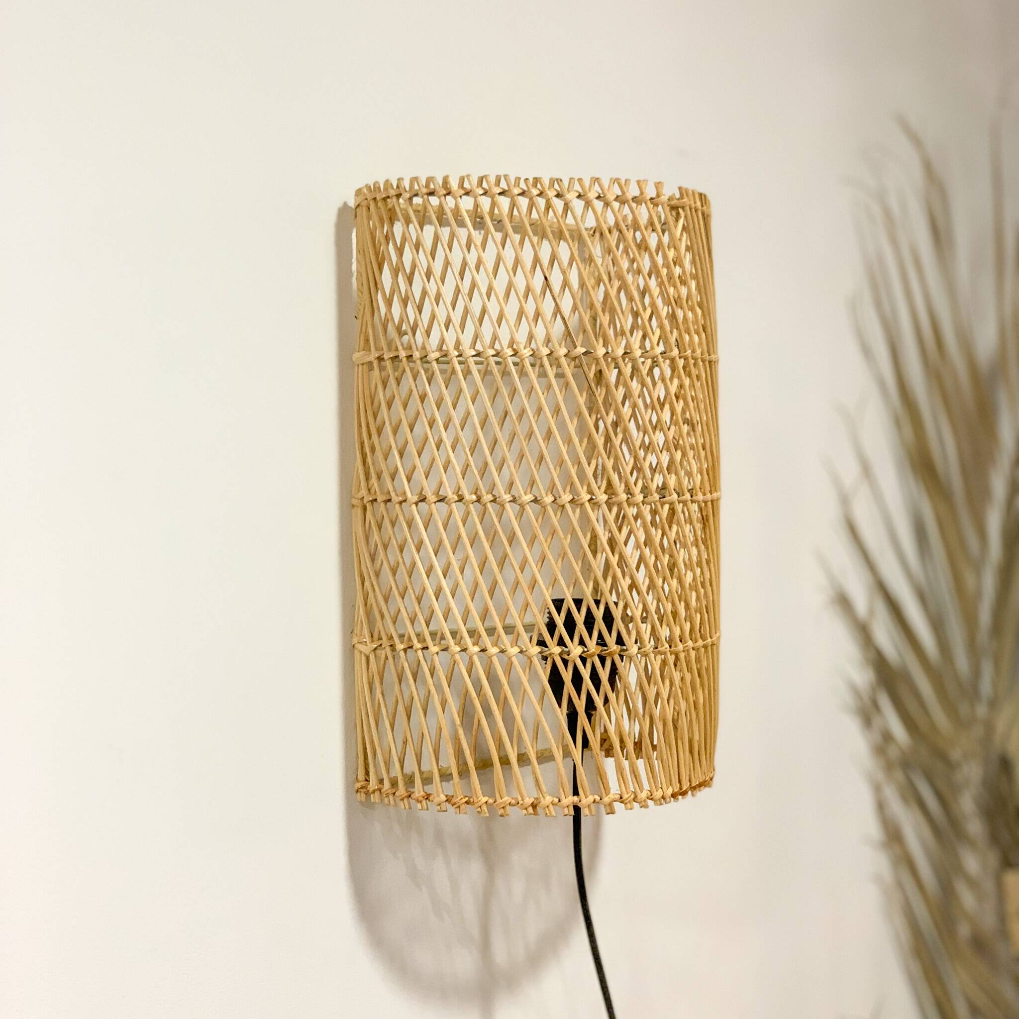 Natural rattan wall light