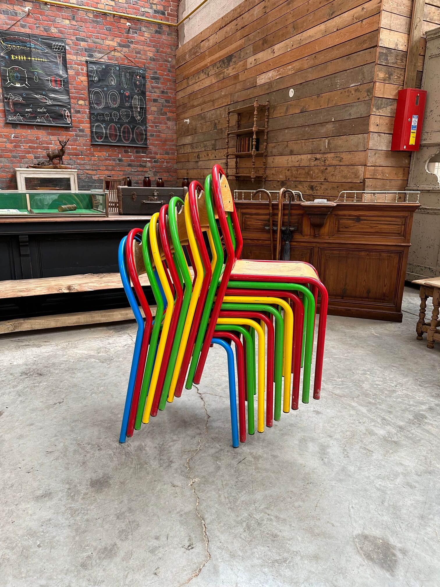 Suite of 10 metal and wood community chairs