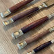 61 covered in rosewood and brass 1950