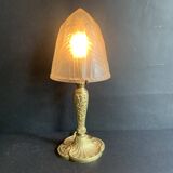 Art Nouveau table lamp in gilded bronze and molded pressed glass globe