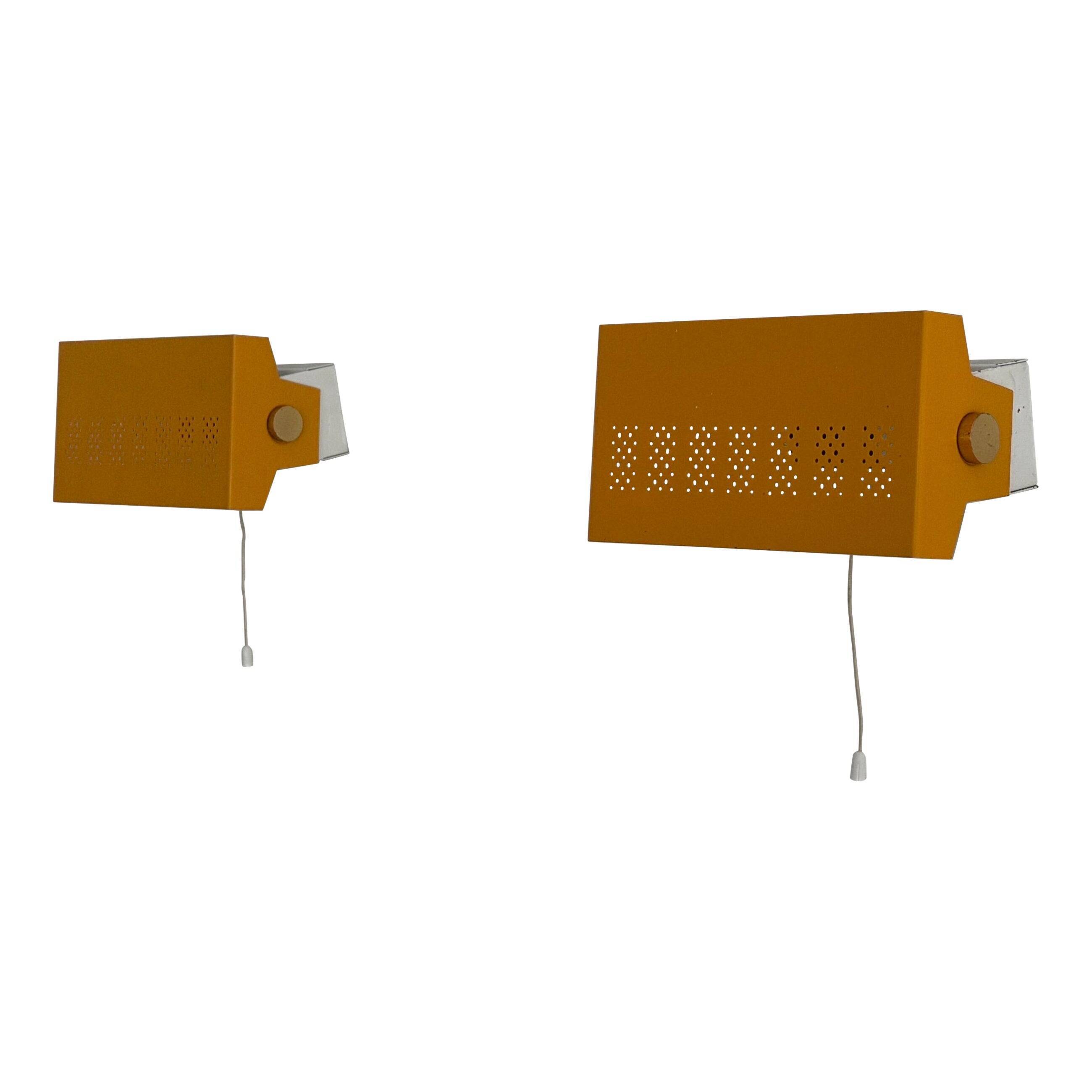 Pair of yellow metal wall lights from the mid-century by N Leuchten, 1960s, Germany.