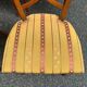 4 Matignon chairs by René Trotel in solid cherry wood and yellow fabric from the 1960s.
