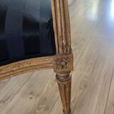 Pair of Louis XVI style cabriolet armchairs in natural wood.