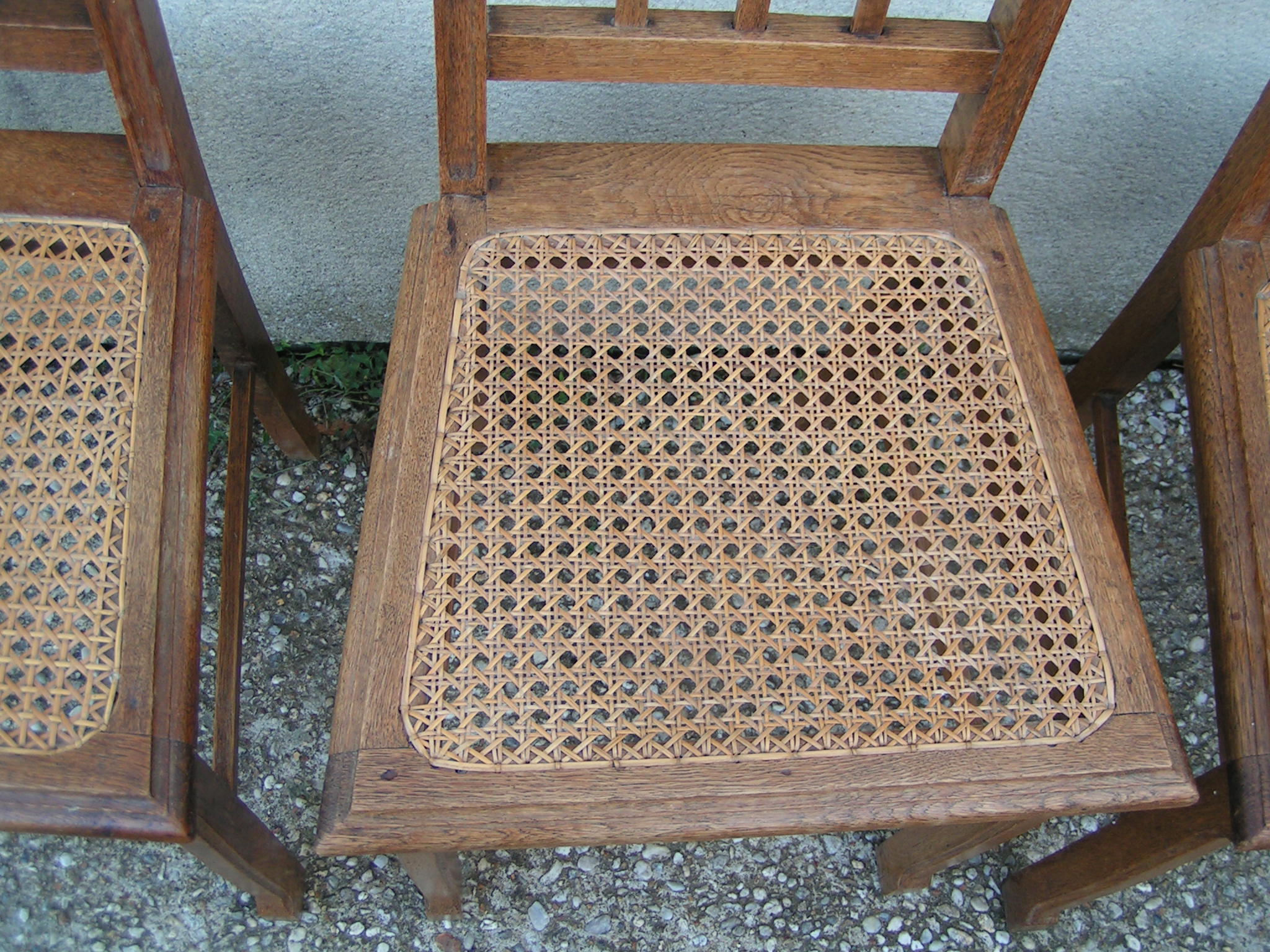 4 chaises cannées en chêne