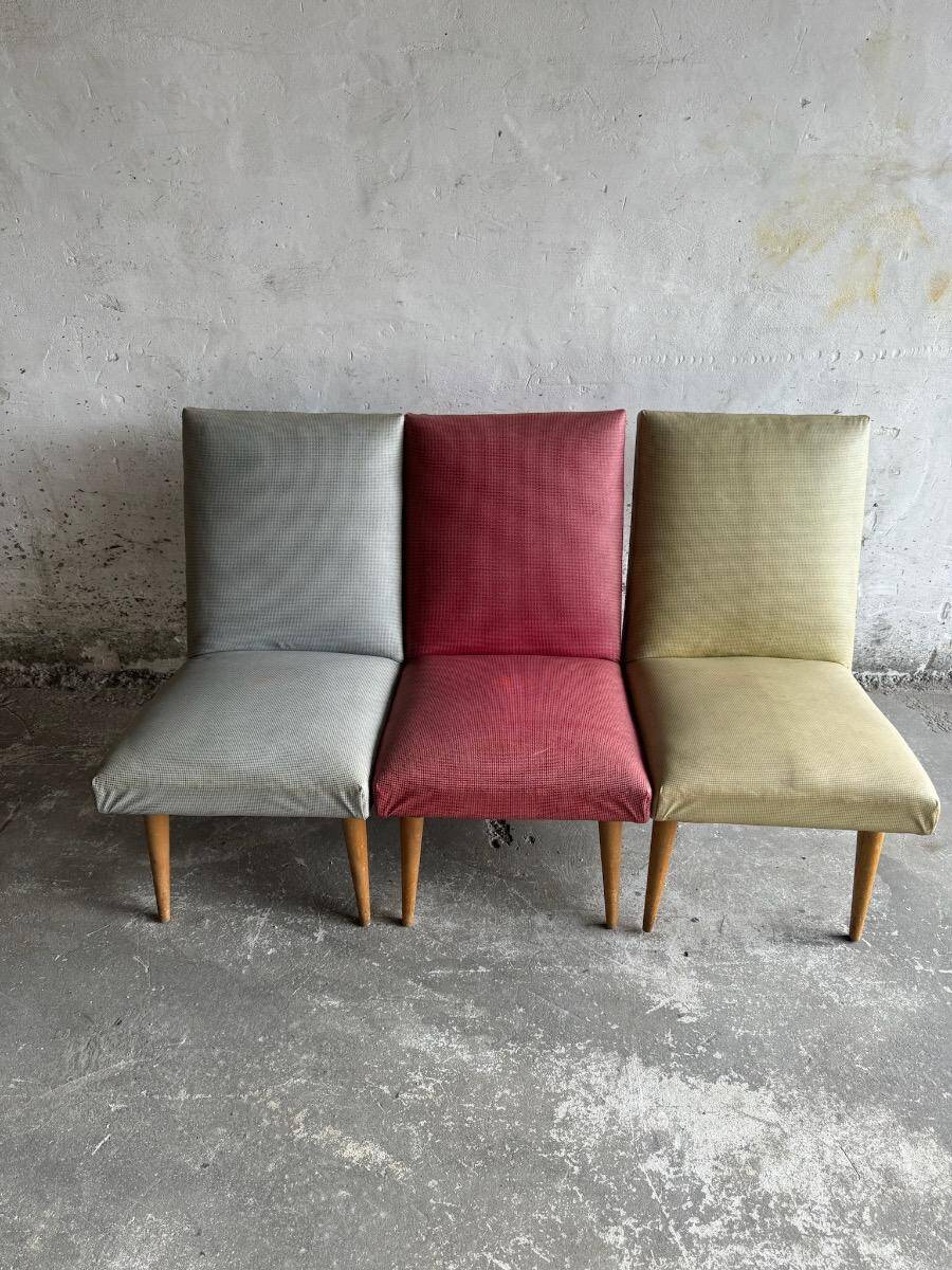 Set of 3 Mid-century club chairs — light blue, wine red & ochre textile with wooden legs