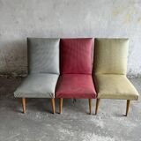 Set of 3 Mid-century club chairs — light blue, wine red & ochre textile with wooden legs