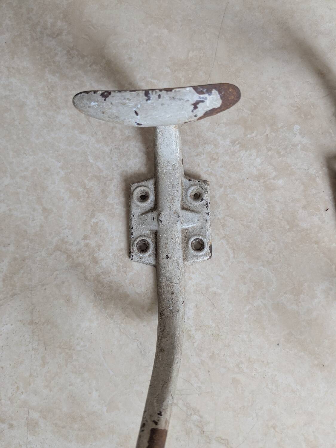 Two vintage coat hooks