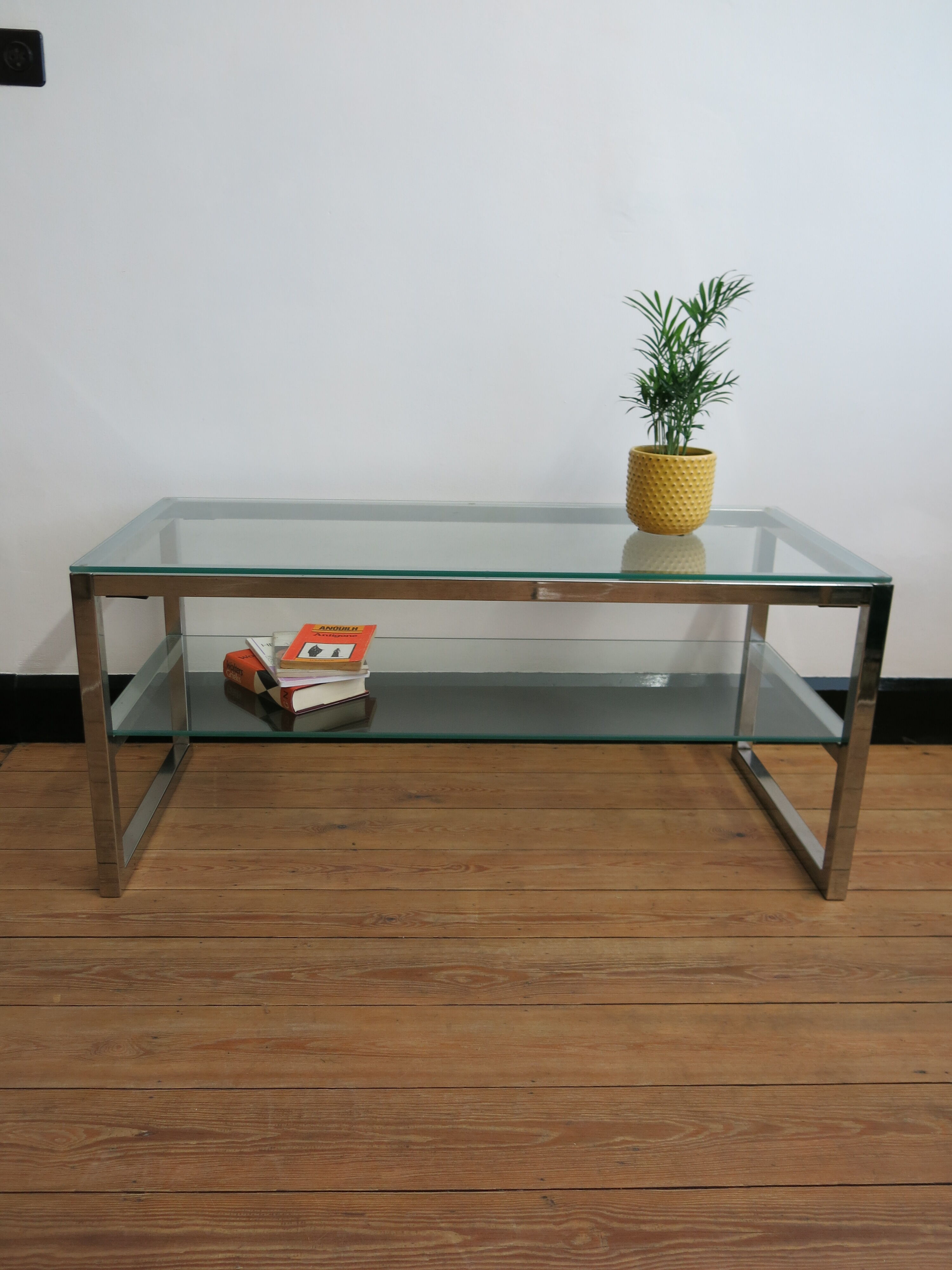 Coffee table in glass and chromed metal