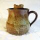 Sandstone pitcher with central reserve