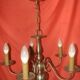 five-armed chandelier in white metal