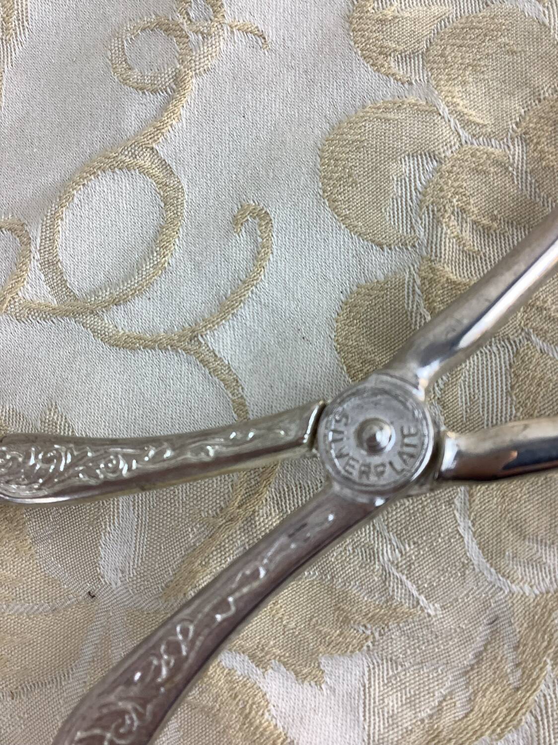 Old cutlery tongs