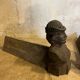 Paire de chenets en fonte visage