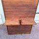 Vintage 1940s secretary desk with wooden curtains, storage, and shutters.