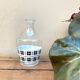 Vintage decanter with black and white tiles