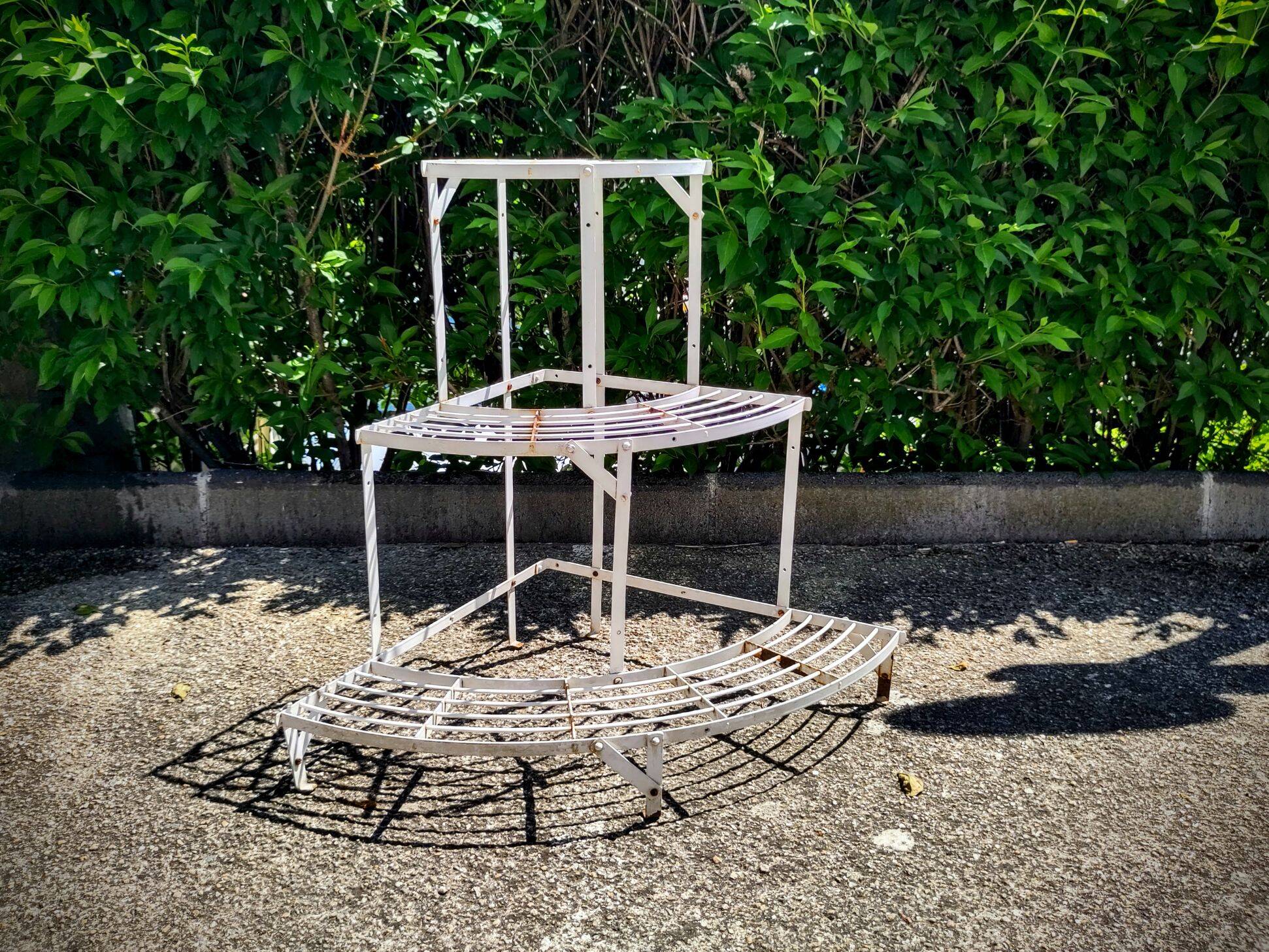 Old metal plant holder