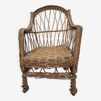 child's or doll's armchair in light woven wicker