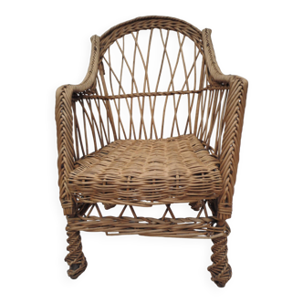 child's or doll's armchair in light woven wicker