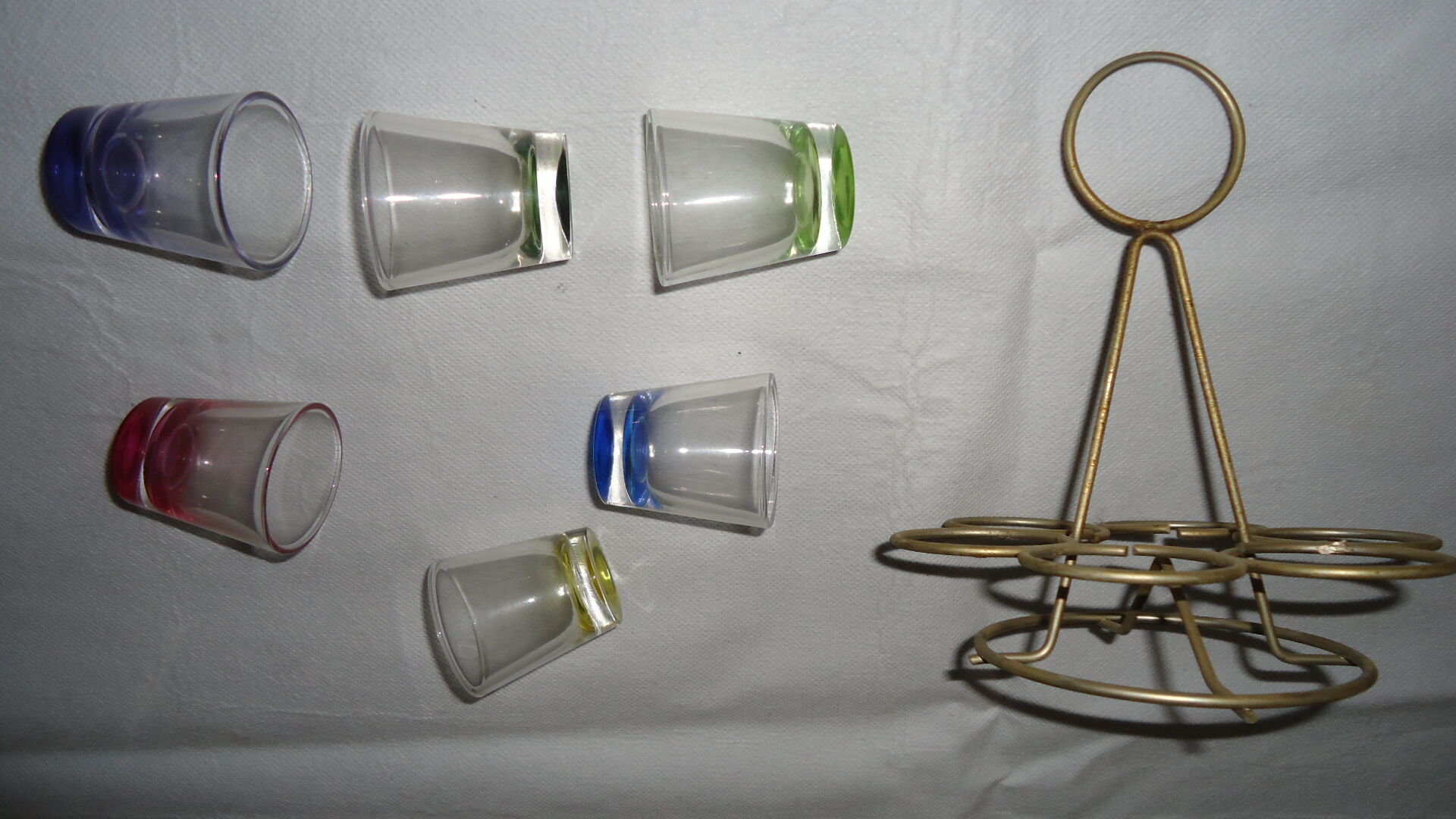Liqueur glasses on vintage stand