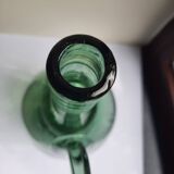 Pair of blown glass wine decanters in blue/green hues.