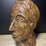 Brutalist head in varnished plaster