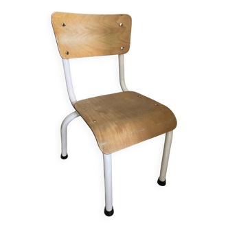 Old wooden and metal children's school chair