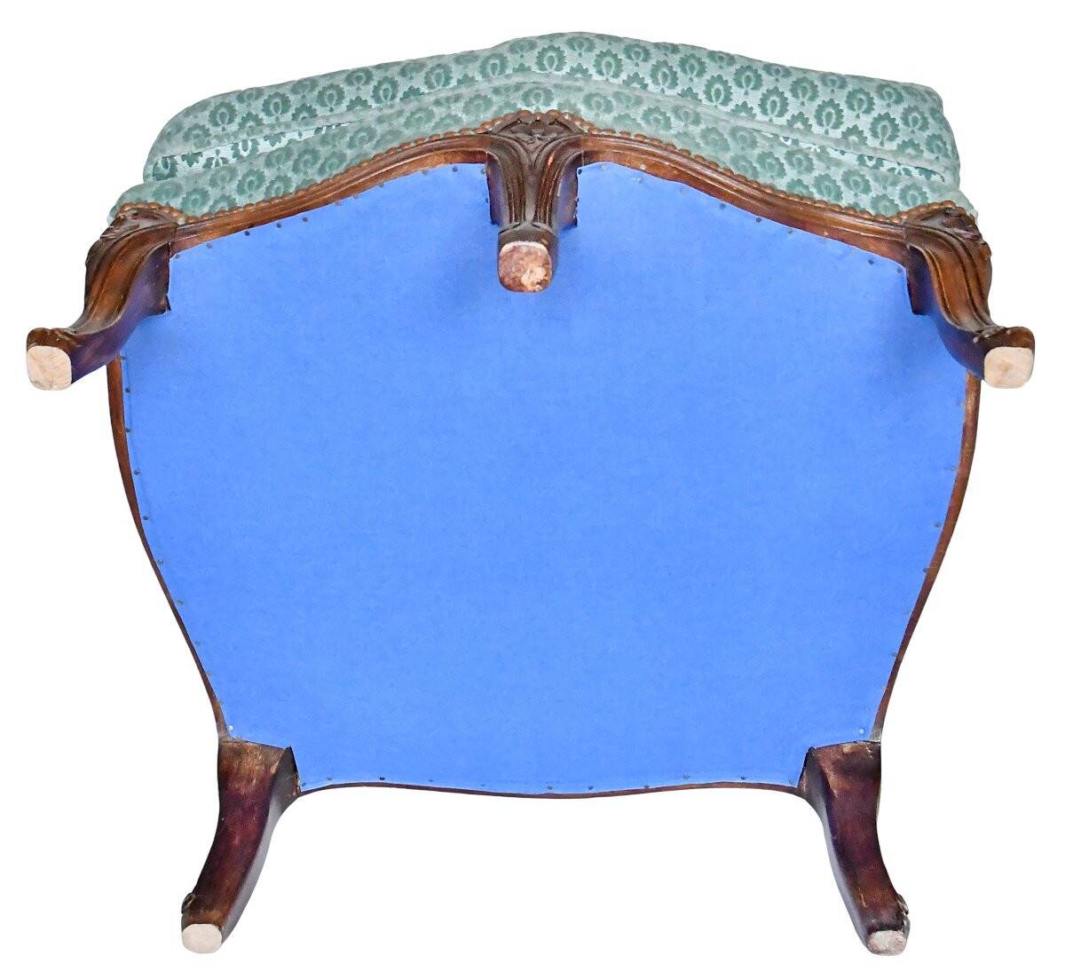 Pair of Louis XV style wingback armchairs with five legs.