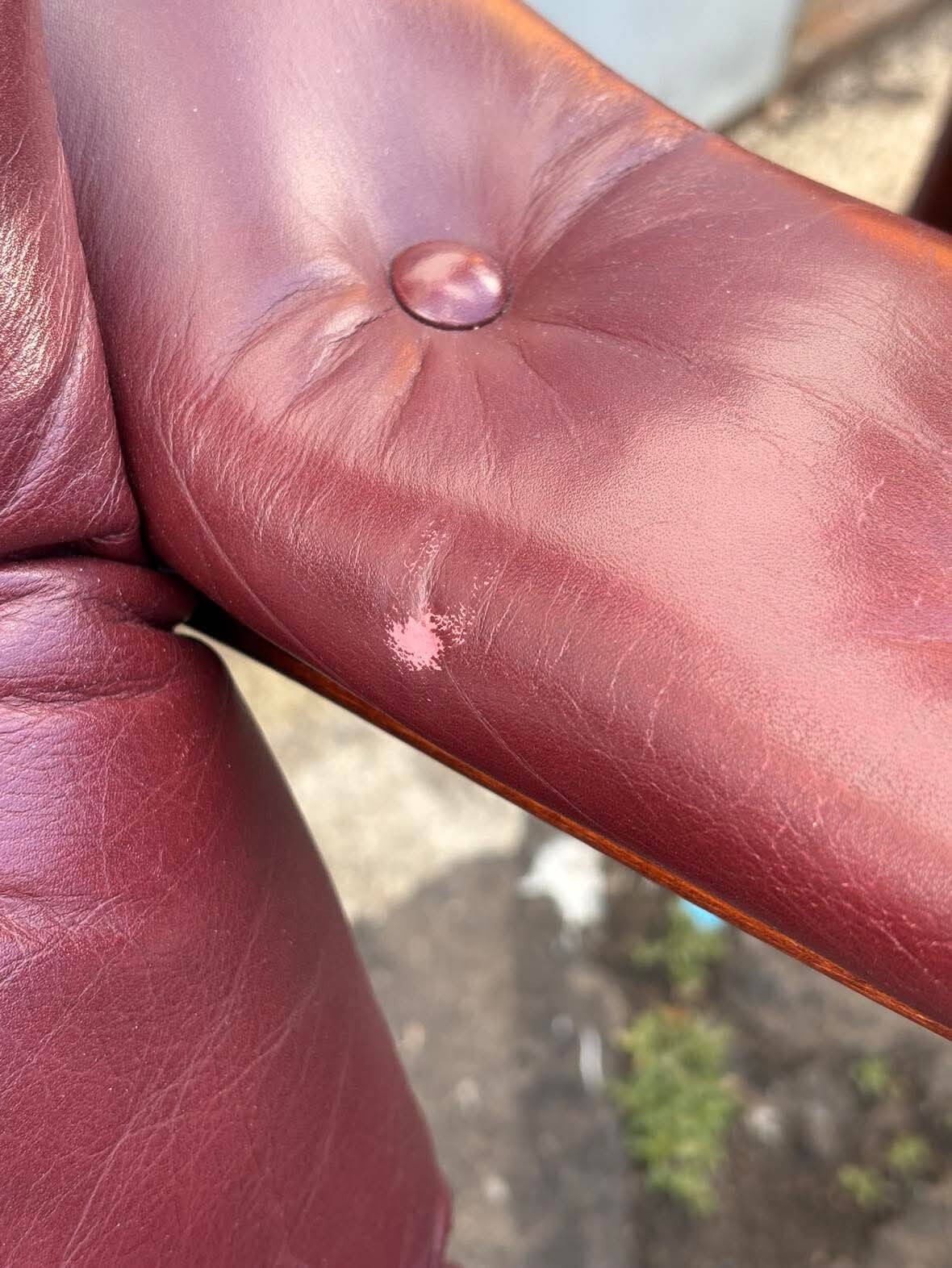 Scandinavian armchair with footrest