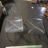 Pair of smoked polycarbonate chairs