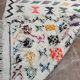 Handwoven Berber kilim rug: small Moroccan decorative rug.