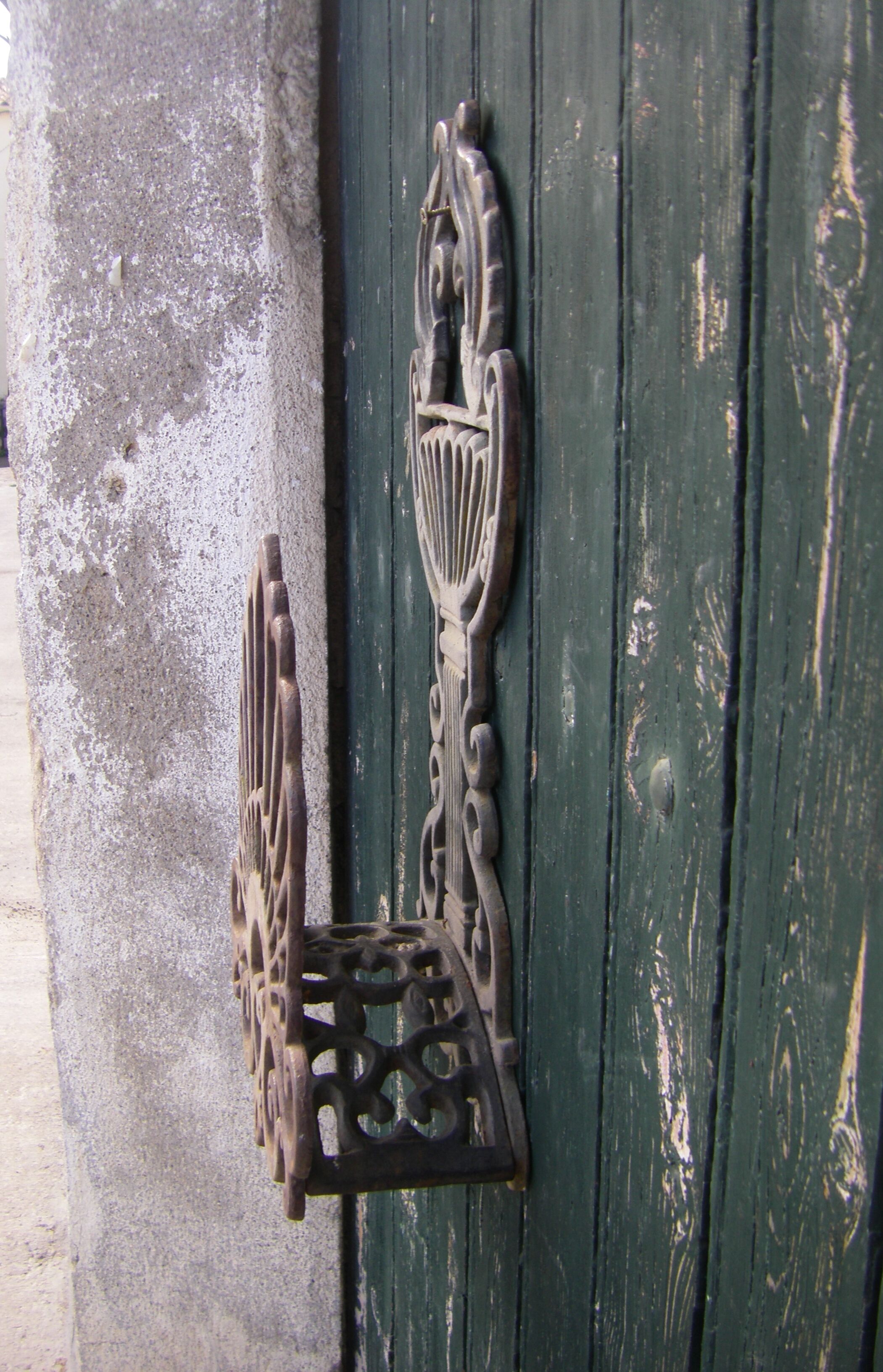 Cast iron garden pipe holder